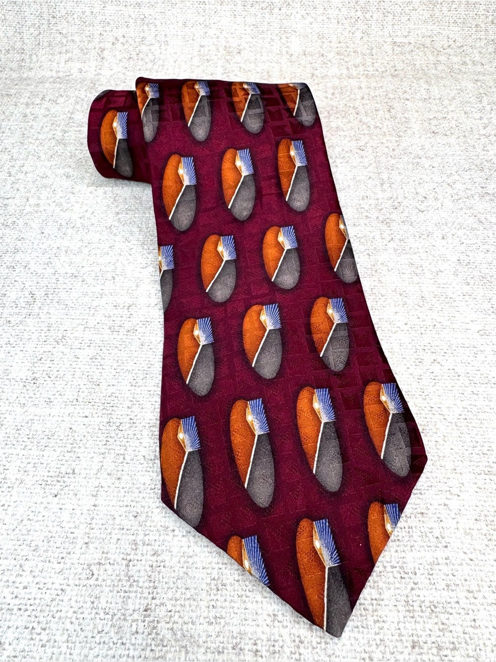 VTG Oscar de la Renta Art Deco silk neck tie in burgundy, orange, gray, and blue